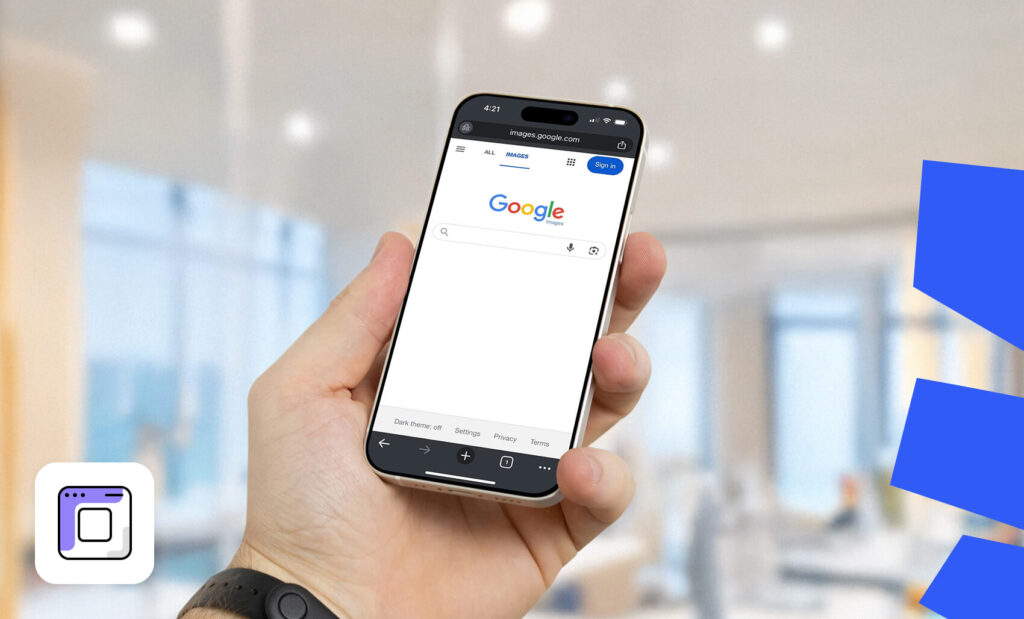 Hand holding a smartphone displaying the Google Images search page, illustrating minimalist design