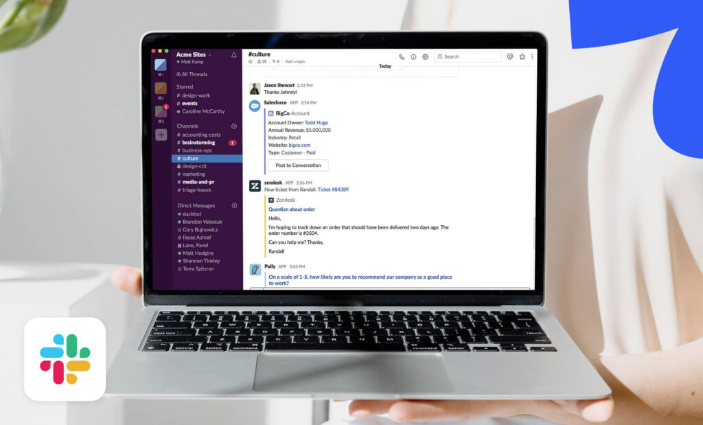 A laptop showing a Slack workspace with active channels
