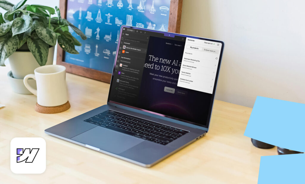 Laptop showing Webflow's website builder interface on a desk with a plant and coffee mug in the background