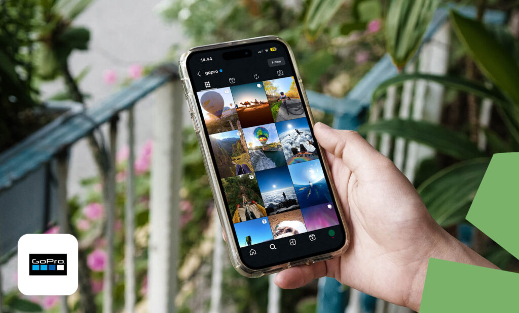 A person holding a smartphone with the Instagram app open on the screen